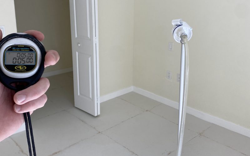 Air sampling set up in a vacant room during a pre purchase inspection